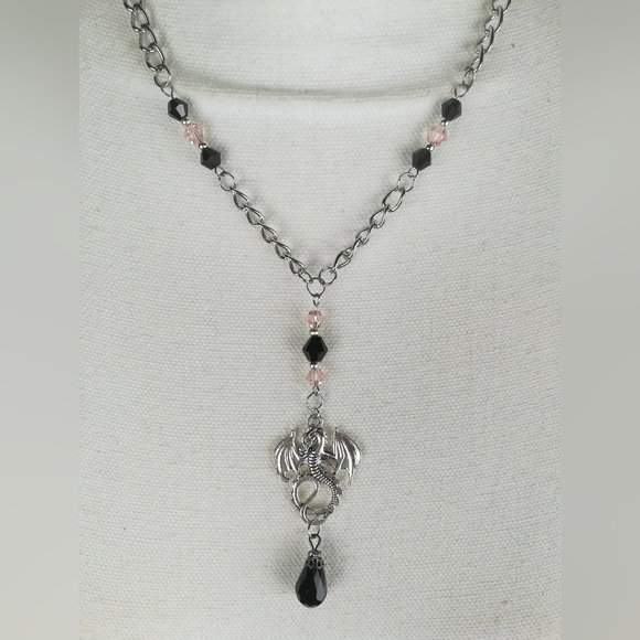 Hand Crafted Jewelry - Dragon fantasy theme necklace light pink and black faceted glass beads.